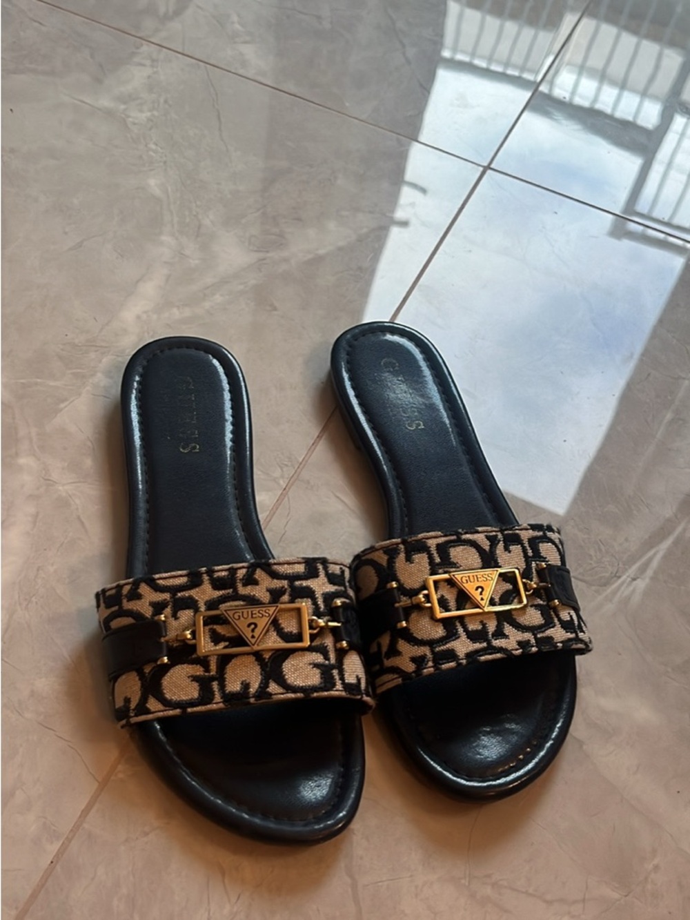 GUESS Black and Beige Logo Slide Mules with Gold Accent